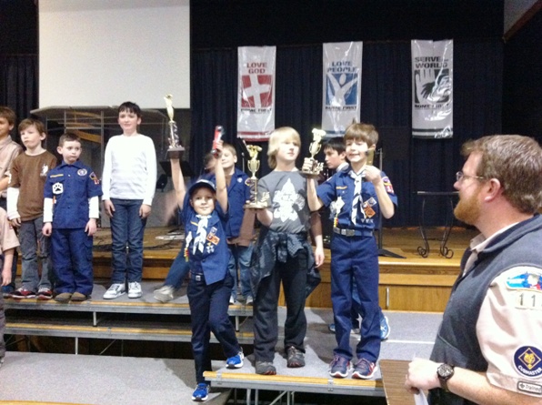 Pack 113 Champions and includes (L to R) Cameron Pickens (1st Place), Aiden Conrad (2nd Place) and Aiden Parsa (3rd Place)
